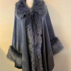 Faux fur, sweater knit cape.